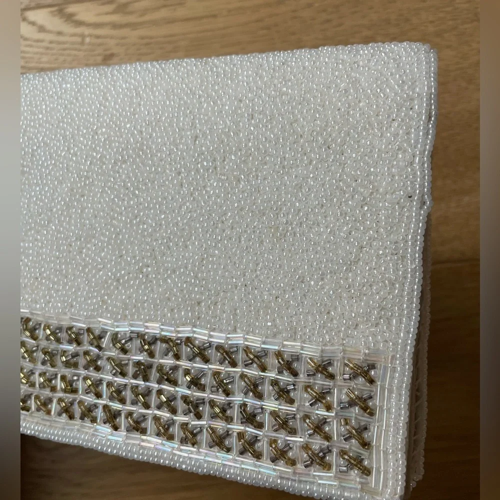 Vintage white beaded clutch with gold detail